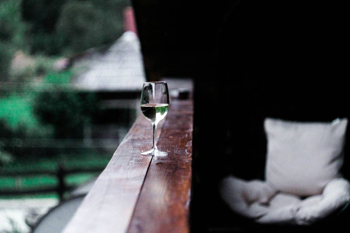 wine glass covers for outdoors keeping chilled white wine protected from insects and sun on a picnic table